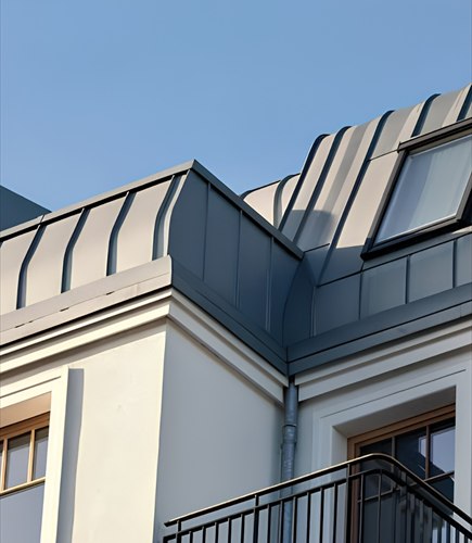 Toiture en zinc à joint debout sur une maison de ville